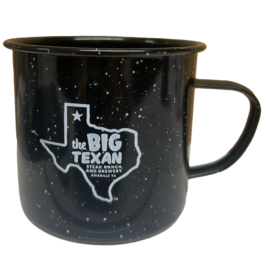 Black mug with a white graphic of the 'The Big Texan' inside the shape of Texas.