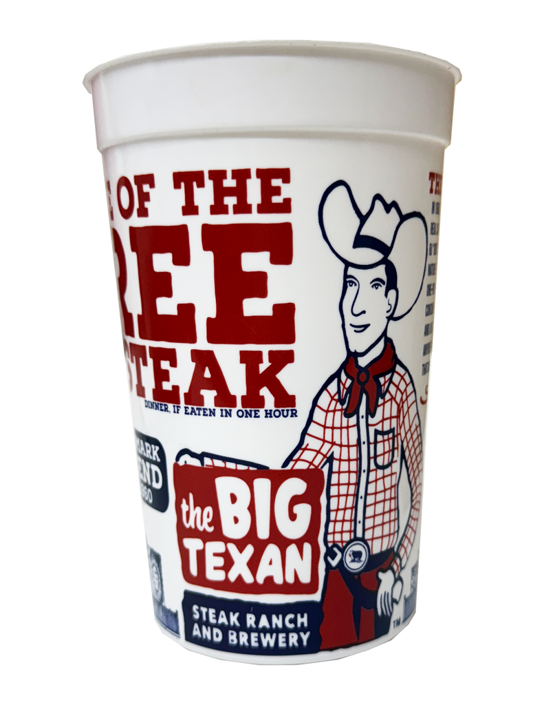 Plastic cup with Big Texan cowboy sign printed on it in red and blue ink