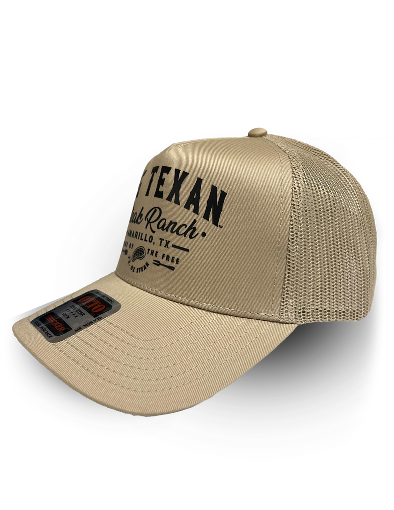 Front view of tan trucker cap with 'Big Texan Steak Ranch Amarillo TX Home of the free 72oz steak' text in black lettering