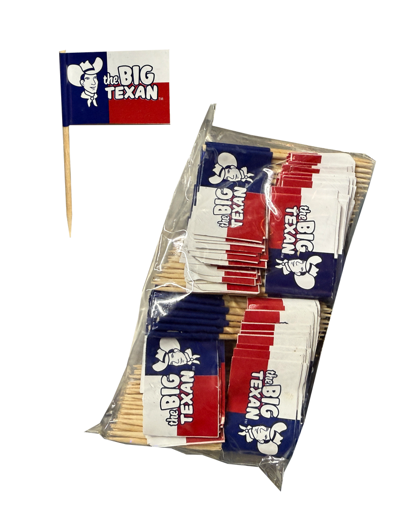 Packaged of 200 toothpicks with 'The Big Texan' flag on them in a plastic bag as well as a single 'the big texan' flag toothpick to the side 