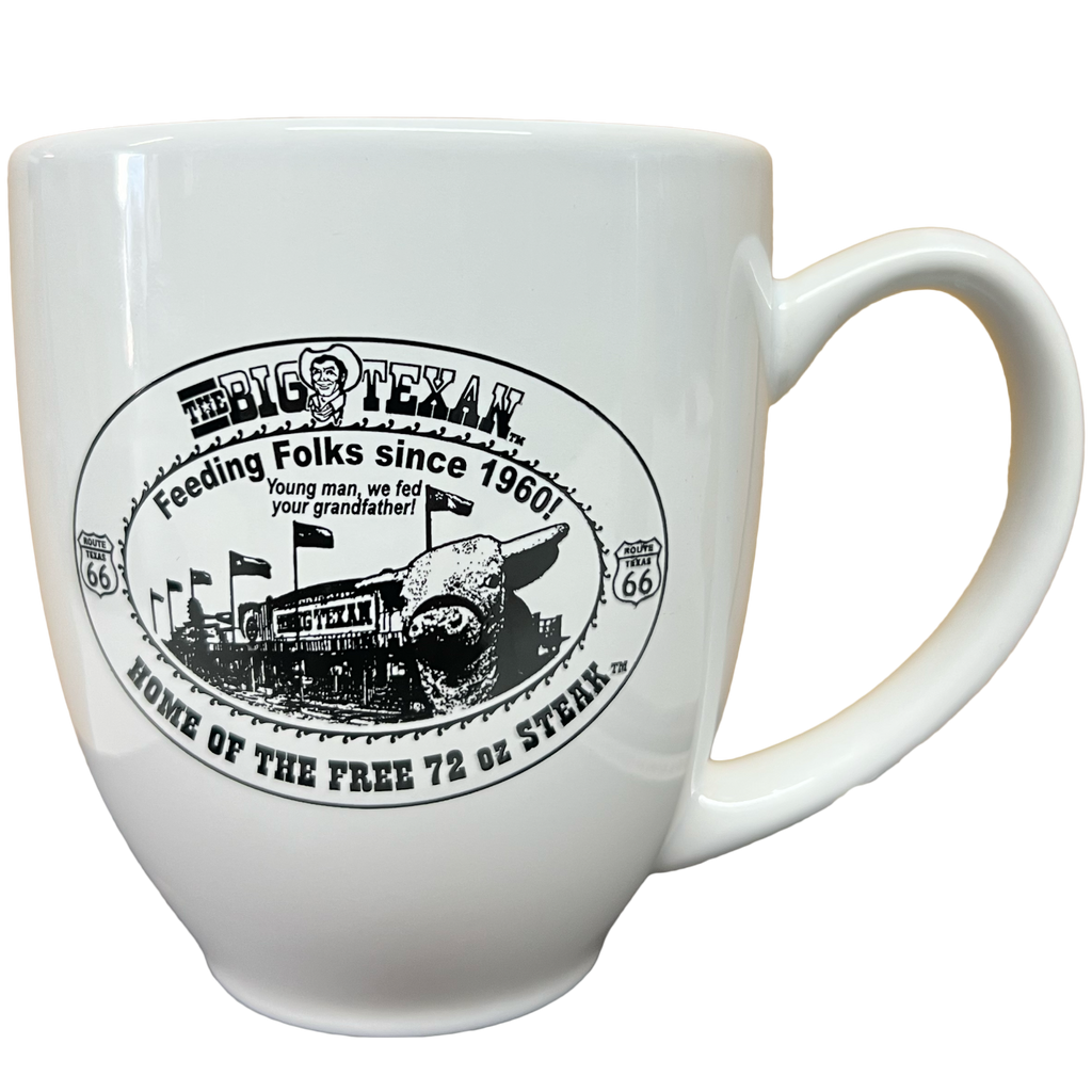White mug with black graphic and text featuring the Big Texan building,